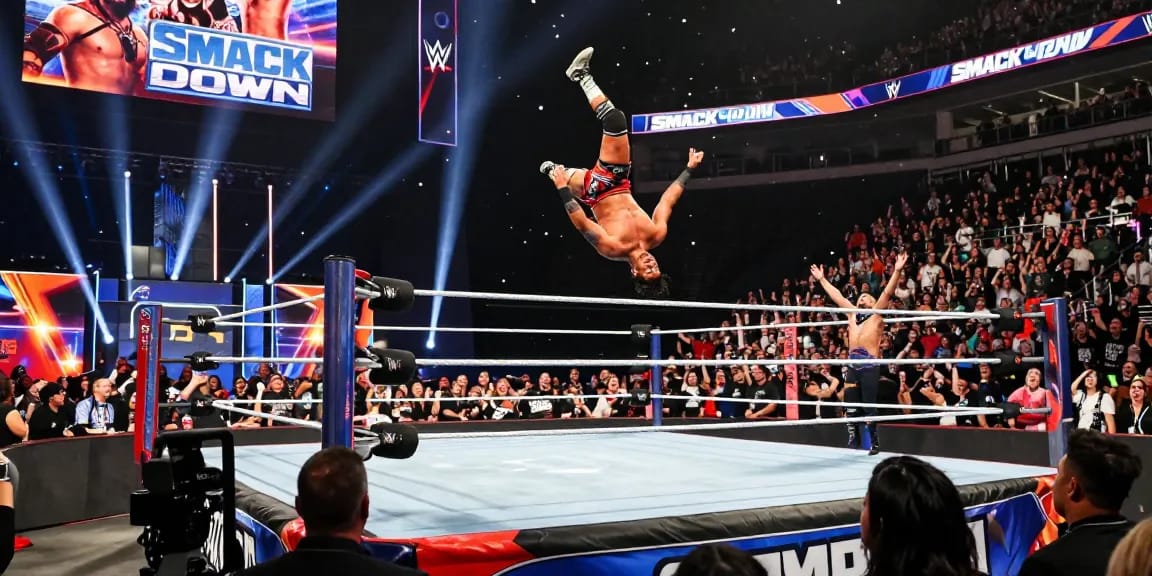 WWE SmackDown live event capturing an exhilarating wrestling moment with fans and vibrant atmosphere.